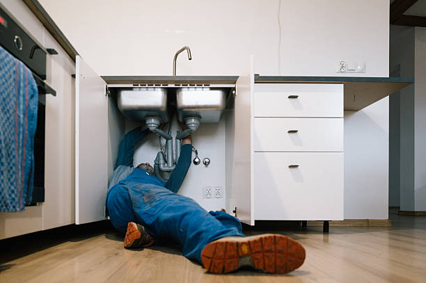 Professional Drain Cleaning technician working in Miller City, IL